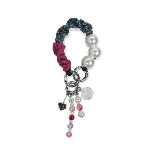 Auren handle in hand-braided TENCEL™ hanging with charm elements