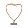 Peach Orange BlingBling wristlet strap highlighted with Tiny Bulb reflectors