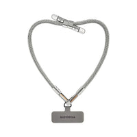 Silver BlingBling wristlet strap displayed on strap card with Tiny Bulb reflector ends