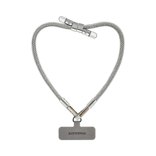 Silver BlingBling wristlet strap displayed on strap card with Tiny Bulb reflector ends