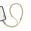 Adjustable golden phone crossbody strap connected to iPhone charging port