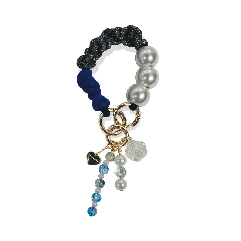 Hades handle in hand-braided TENCEL™ hanging with charm details