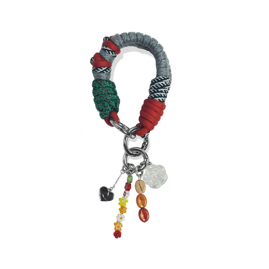 Lyra handle in hand-braided TENCEL™ hanging with charm attachments