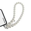 Shoulder strap attached to phone case with strap card, perfect as a phone or bag accessory.