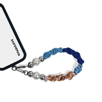 Titan wristlet connected to phone case using strap card for easy access