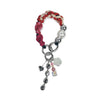 Hand-braided TENCEL™ handle in Rhea hanging with charm elements