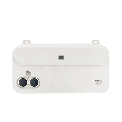 Sleek profile: Silver strap-ready ears on minimalist white iPhone 16 case with dual-camera guard