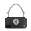 Silver phone strap securely mounted on FABULOVE iPhone case lanyard holes