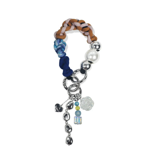 Titan handle in hand-braided TENCEL™ hanging with attached charms